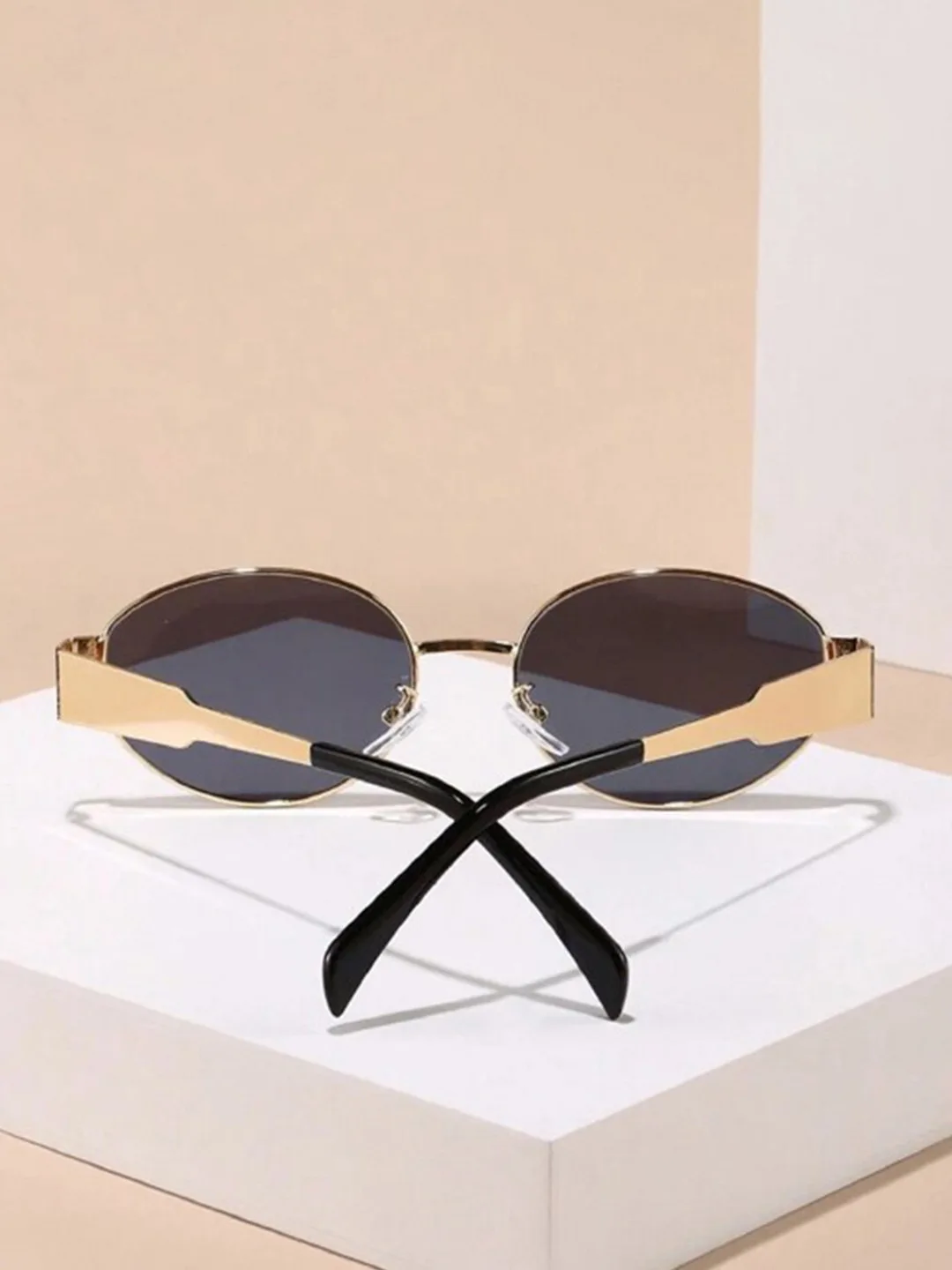 HAYDEN haiza Small oval sunglasses, dark lens