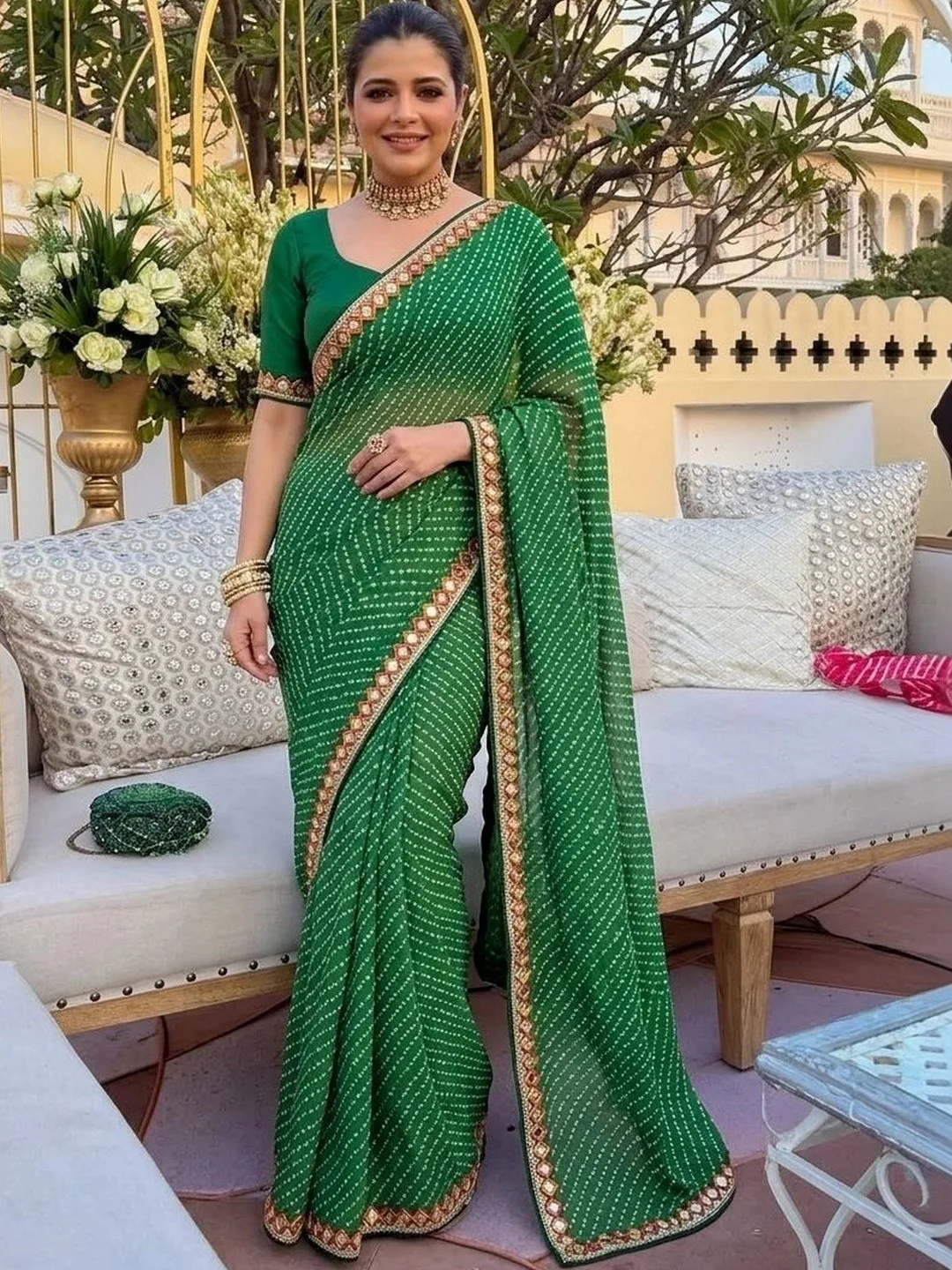 Emerald bandhani georgette saree with a mirror-work border