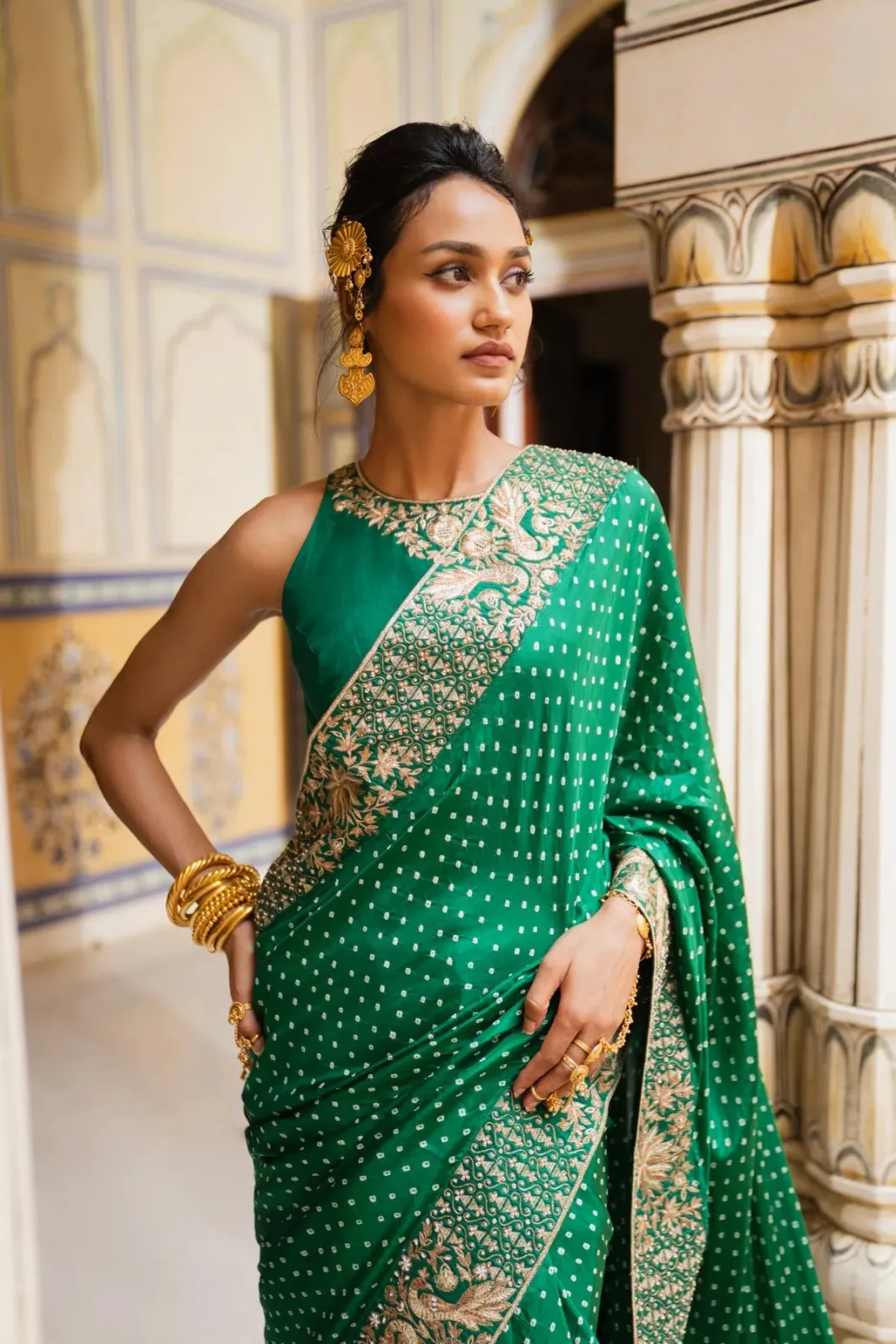 Pink City by Sarika Peacock and lotus bandhni saree