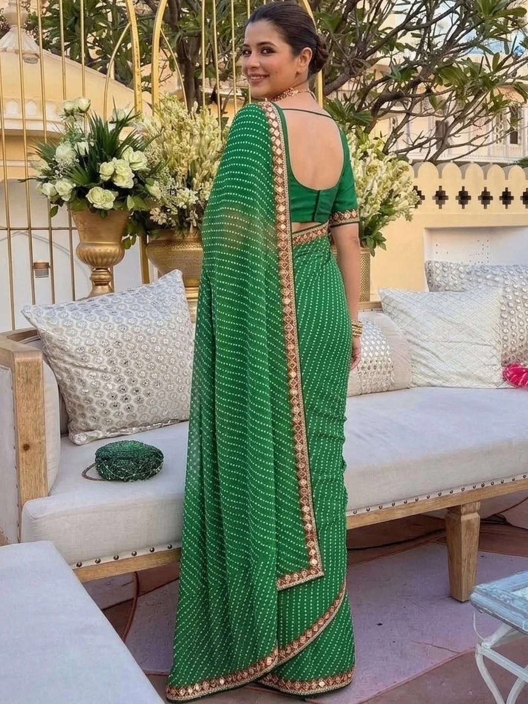 Sangria Emerald bandhani georgette saree with a mirror-work border