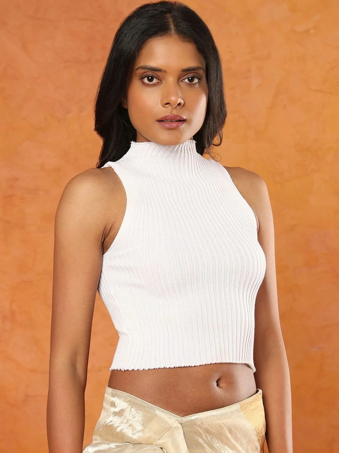 KALINI Sleeveless high-neck blouse
