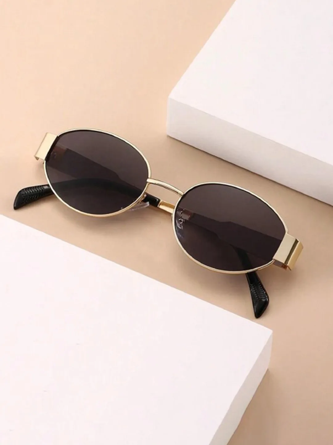 HAYDEN haiza Small oval sunglasses, dark lens