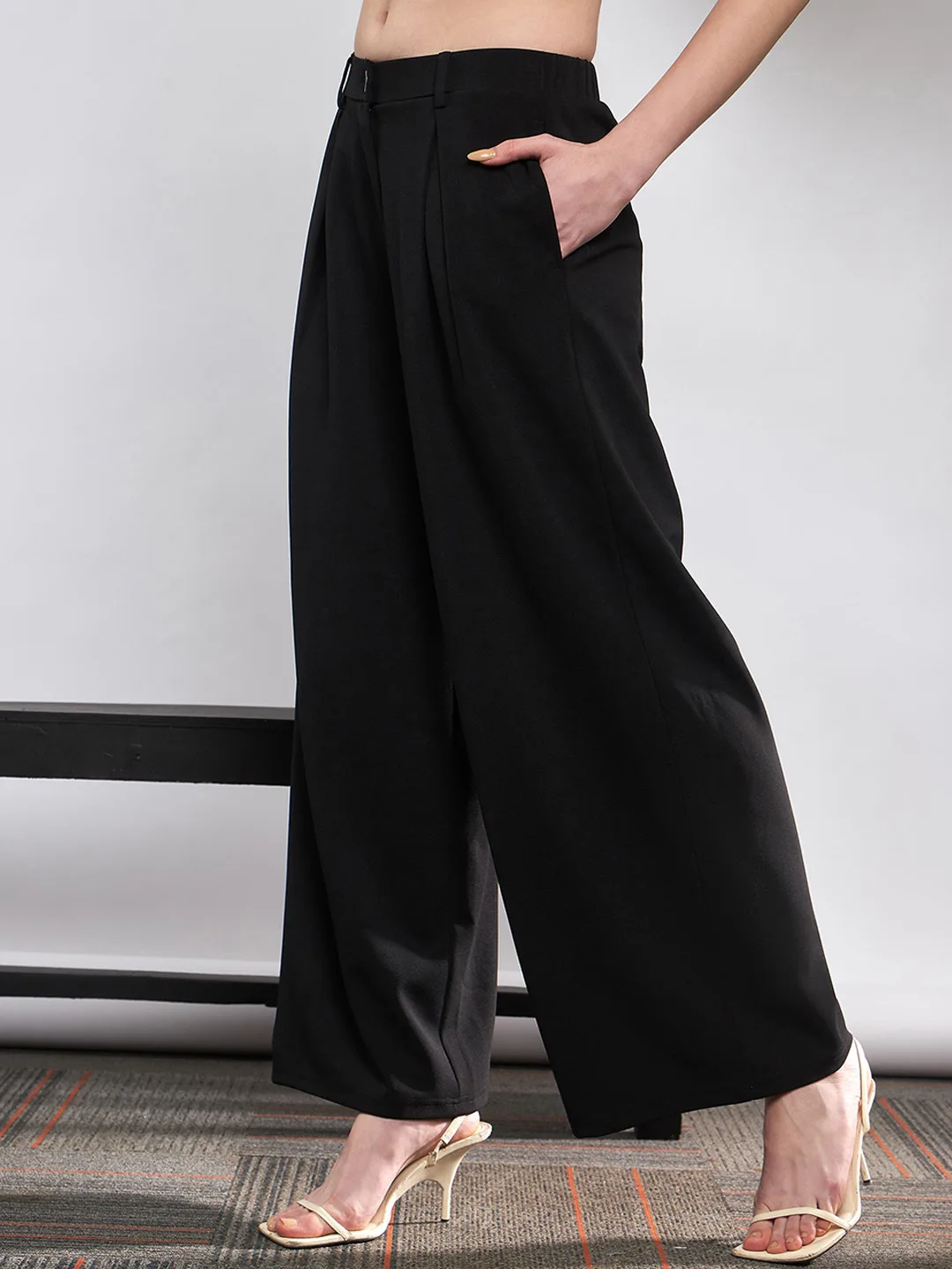 SASSAFRAS Black pleated wide-leg trousers