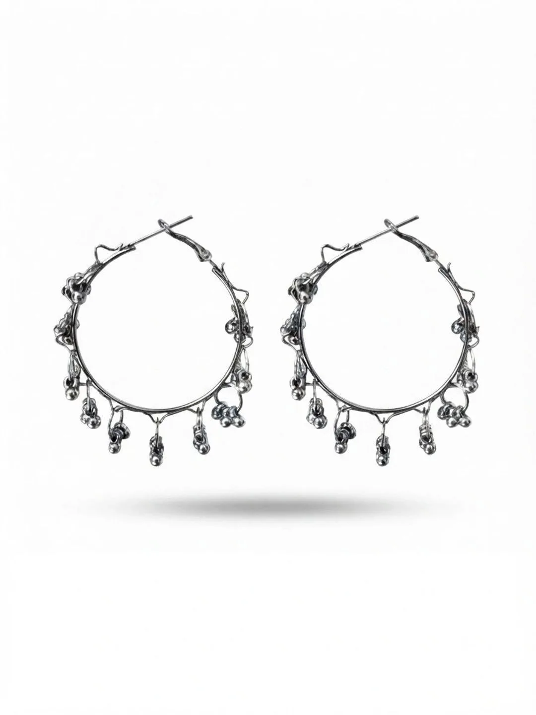 Nityakshi Oxidised silver hoop earrings with ghungroo drops