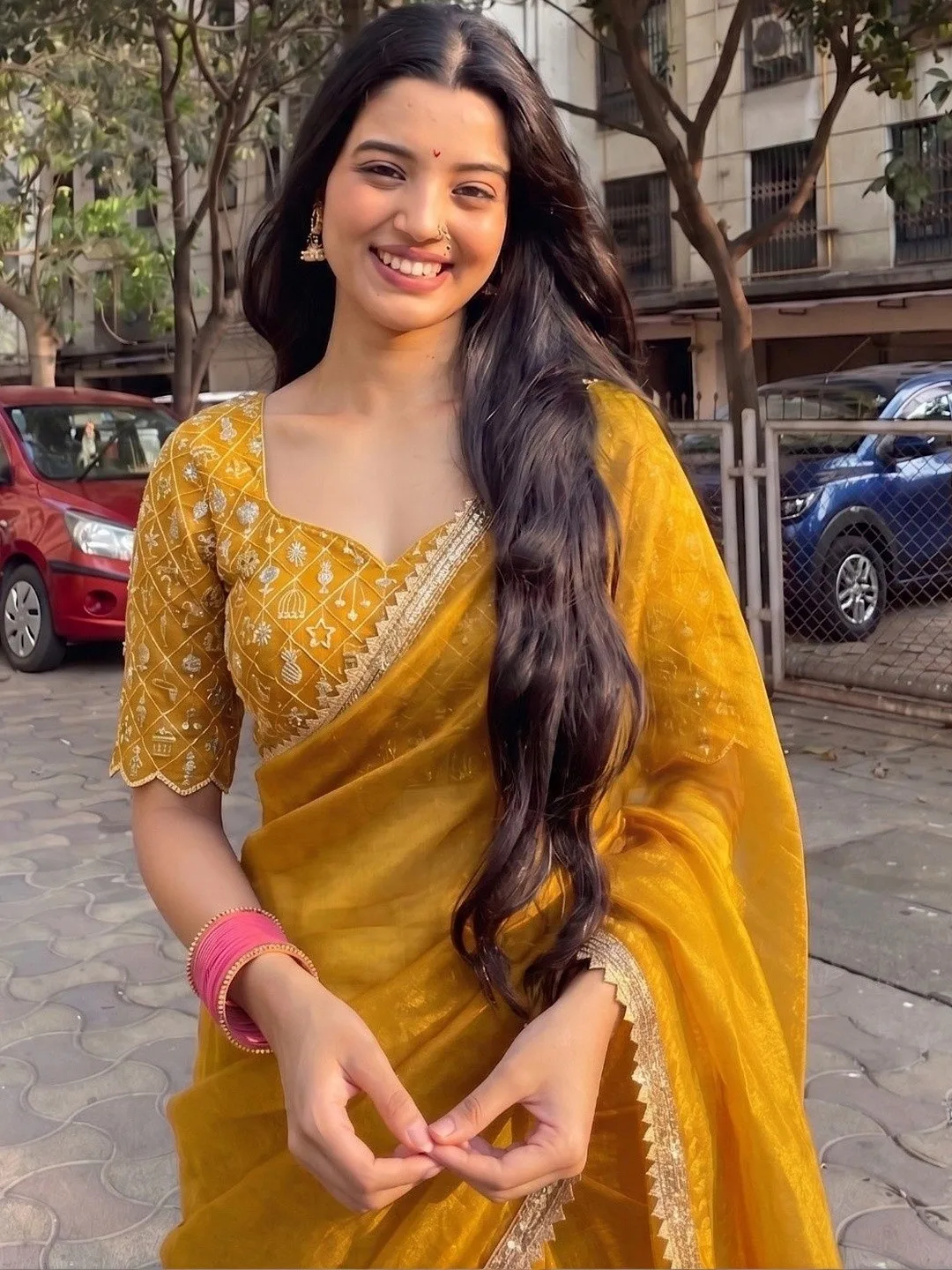Shreevally Our pick under ₹750 — sheer yellow organza saree with a scalloped gold edge
