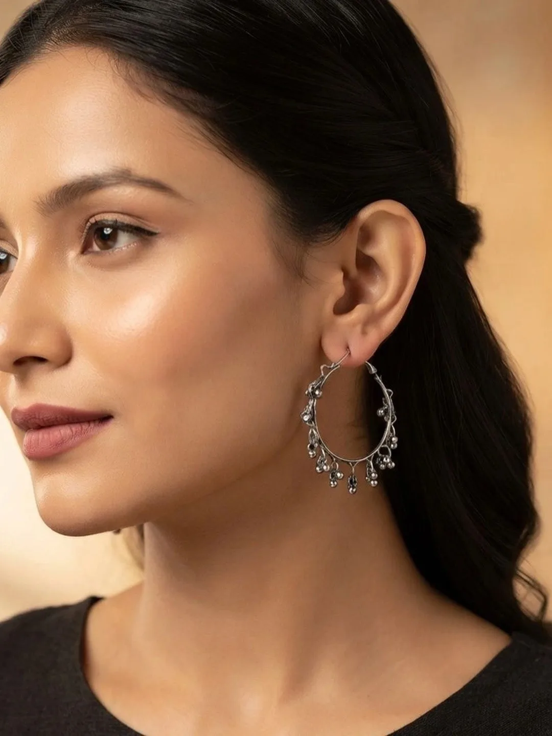 Nityakshi Oxidised silver hoop earrings with ghungroo drops
