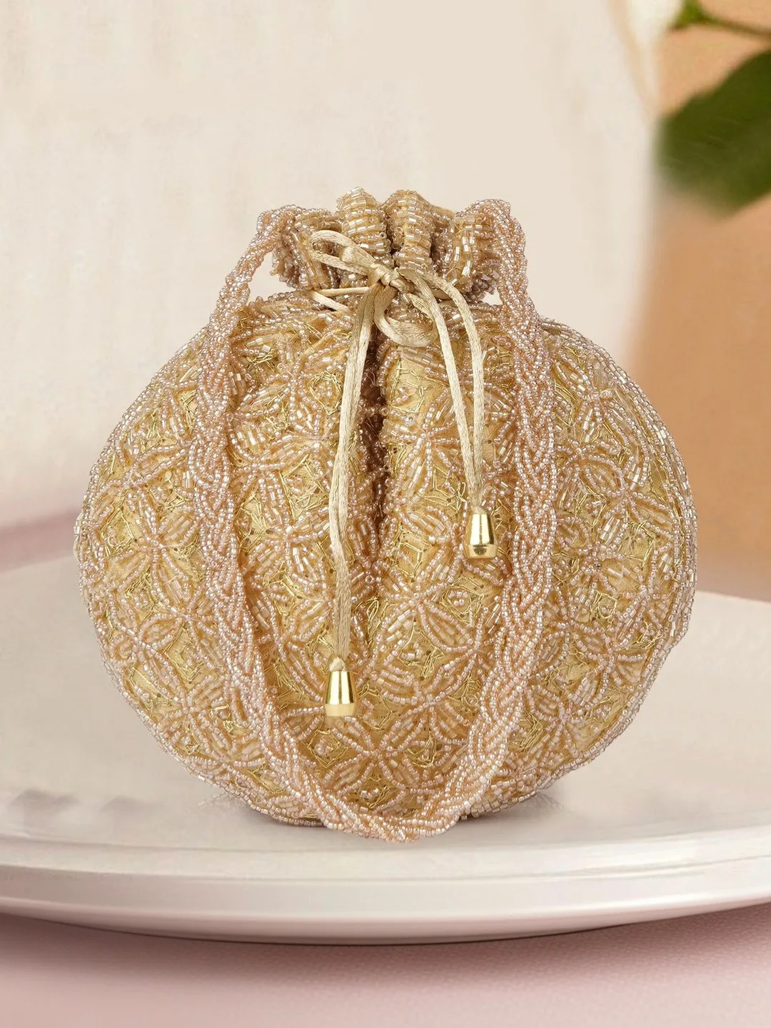 Gold embroidered potli