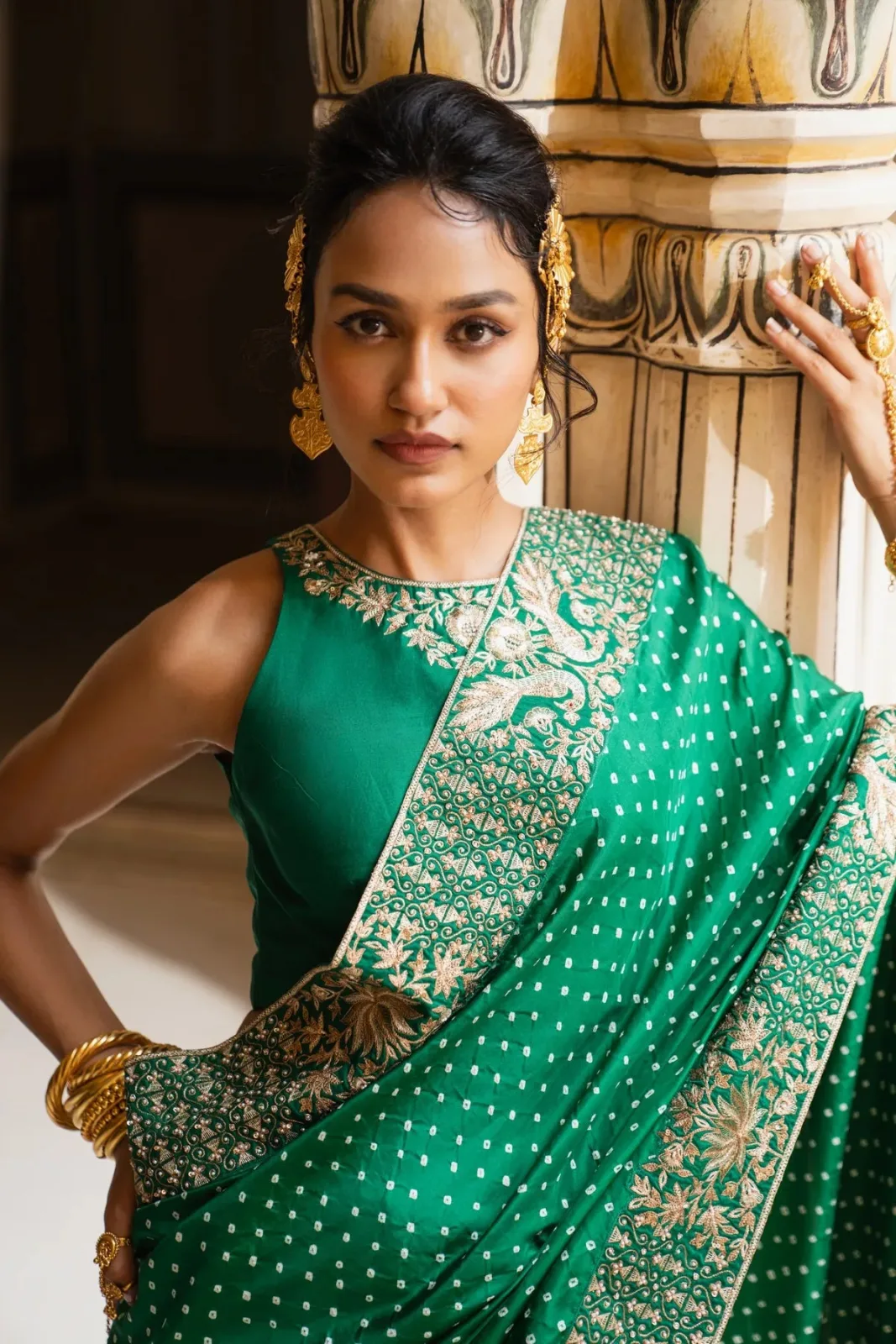 Pink City by Sarika Peacock and lotus bandhni saree