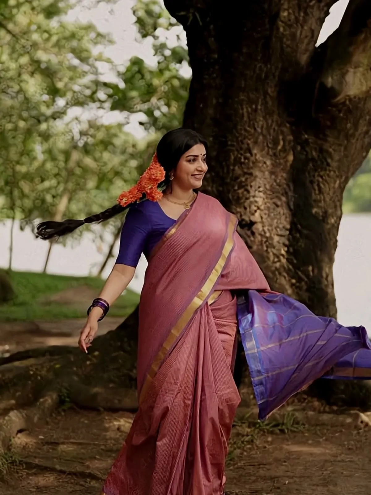 Meera Jasmine — Turning, glass bangles on the wrist