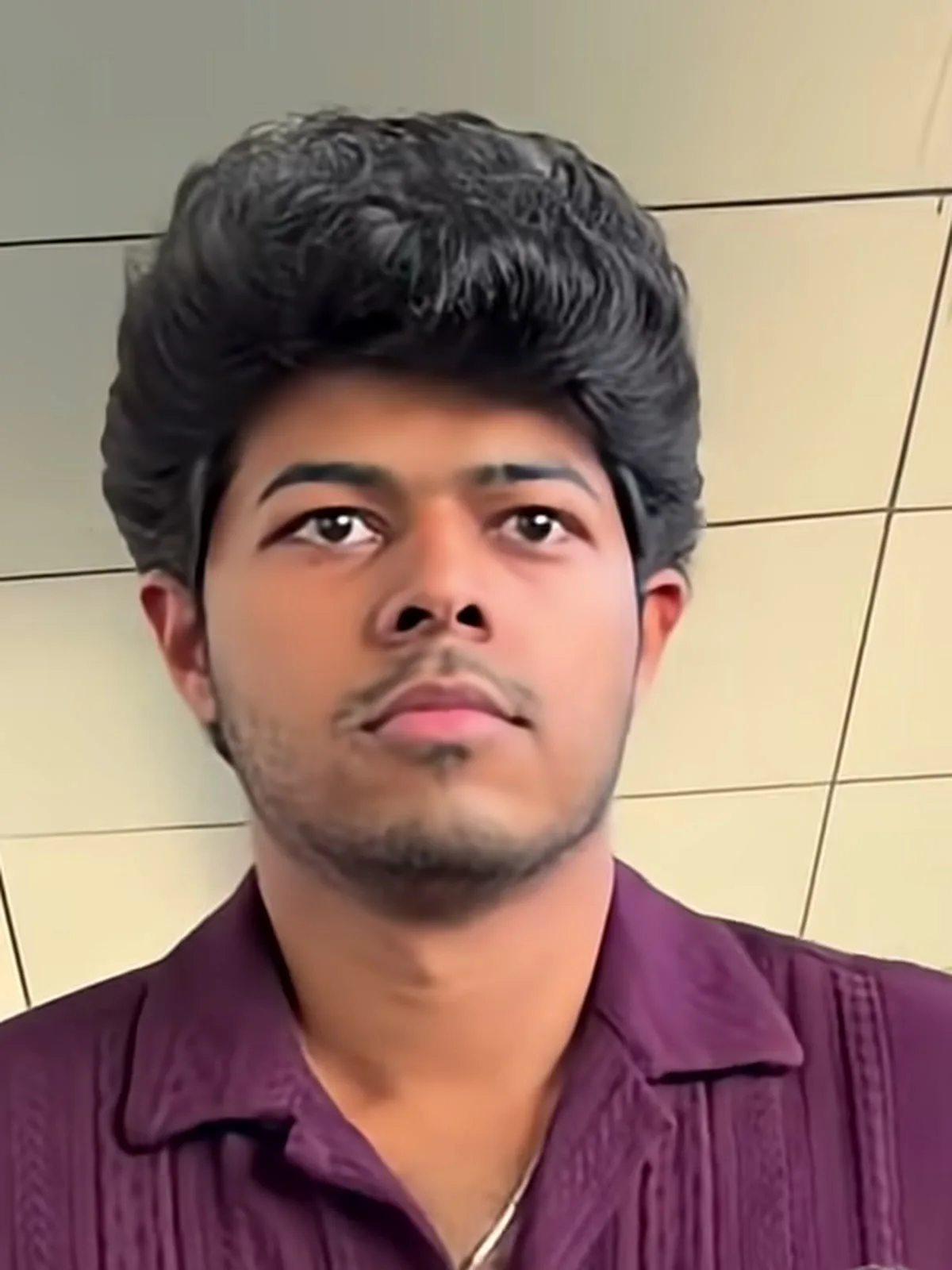 Jason Sanjay — Close on the collar: it lies flat and open, with the top button undone