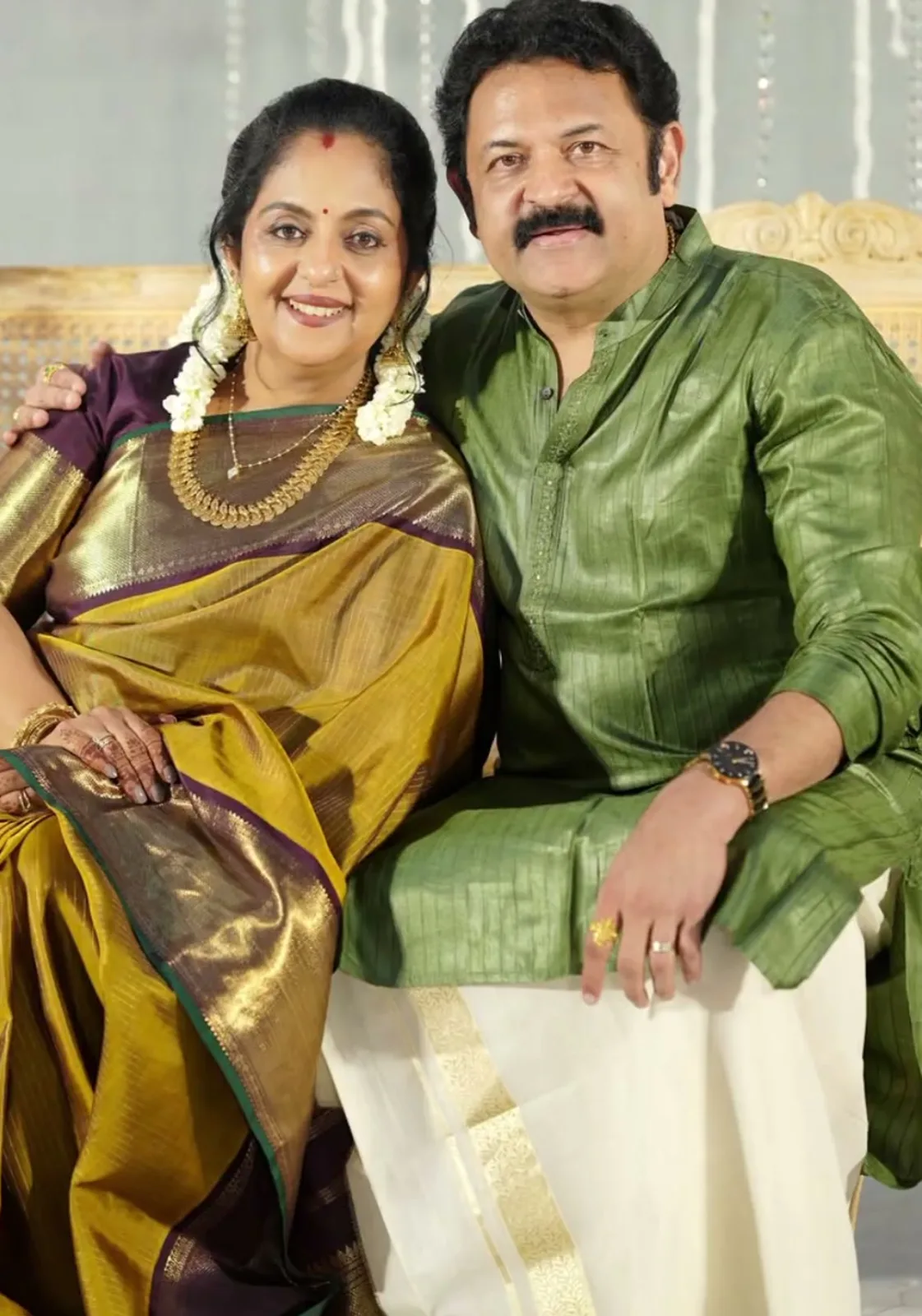 Sindhu Krishna — With Krishna Kumar, the pallu falling across her lap