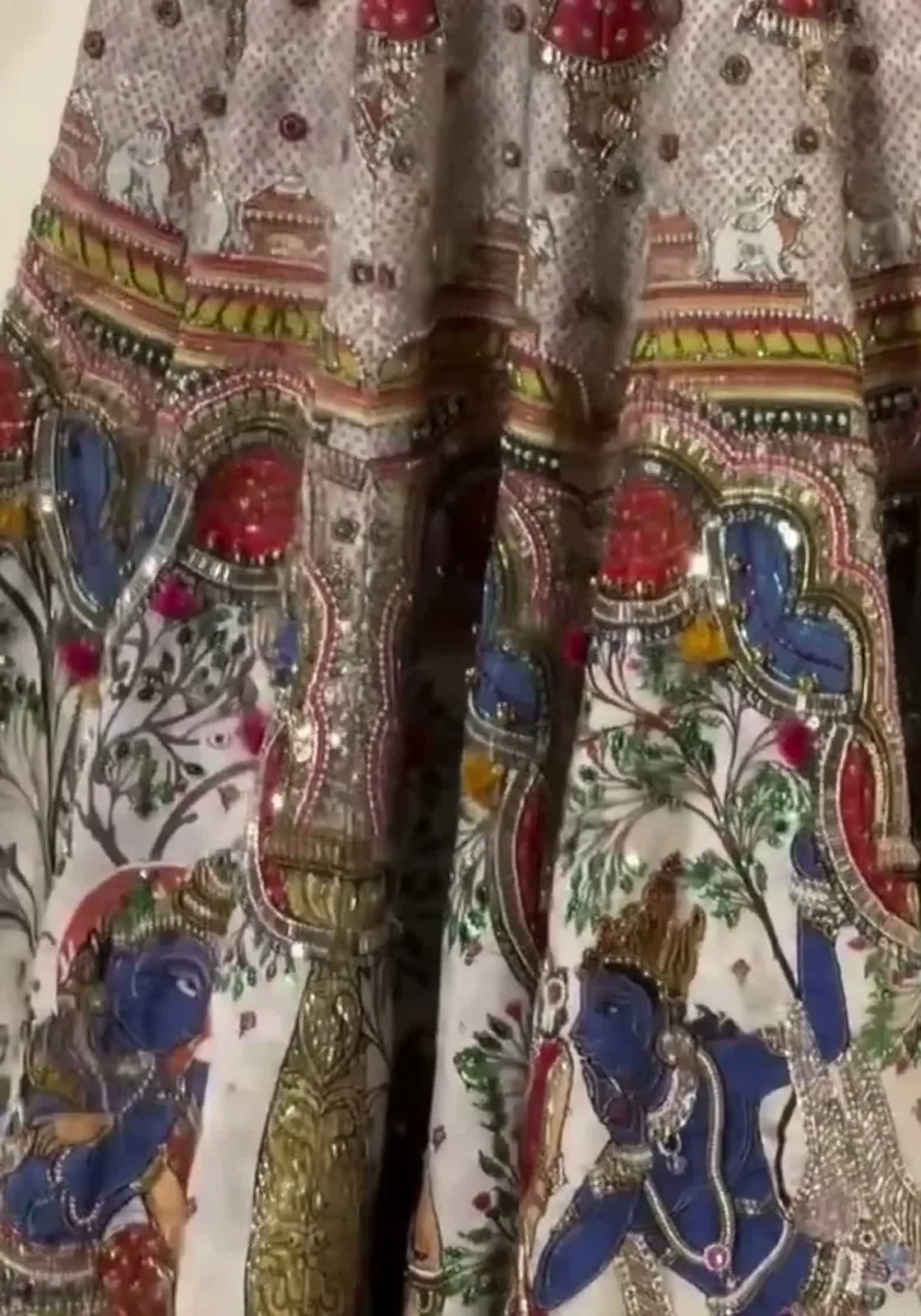 Isha Ambani — The skirt up close: Krishna in deep blue, painted and then embroidered over