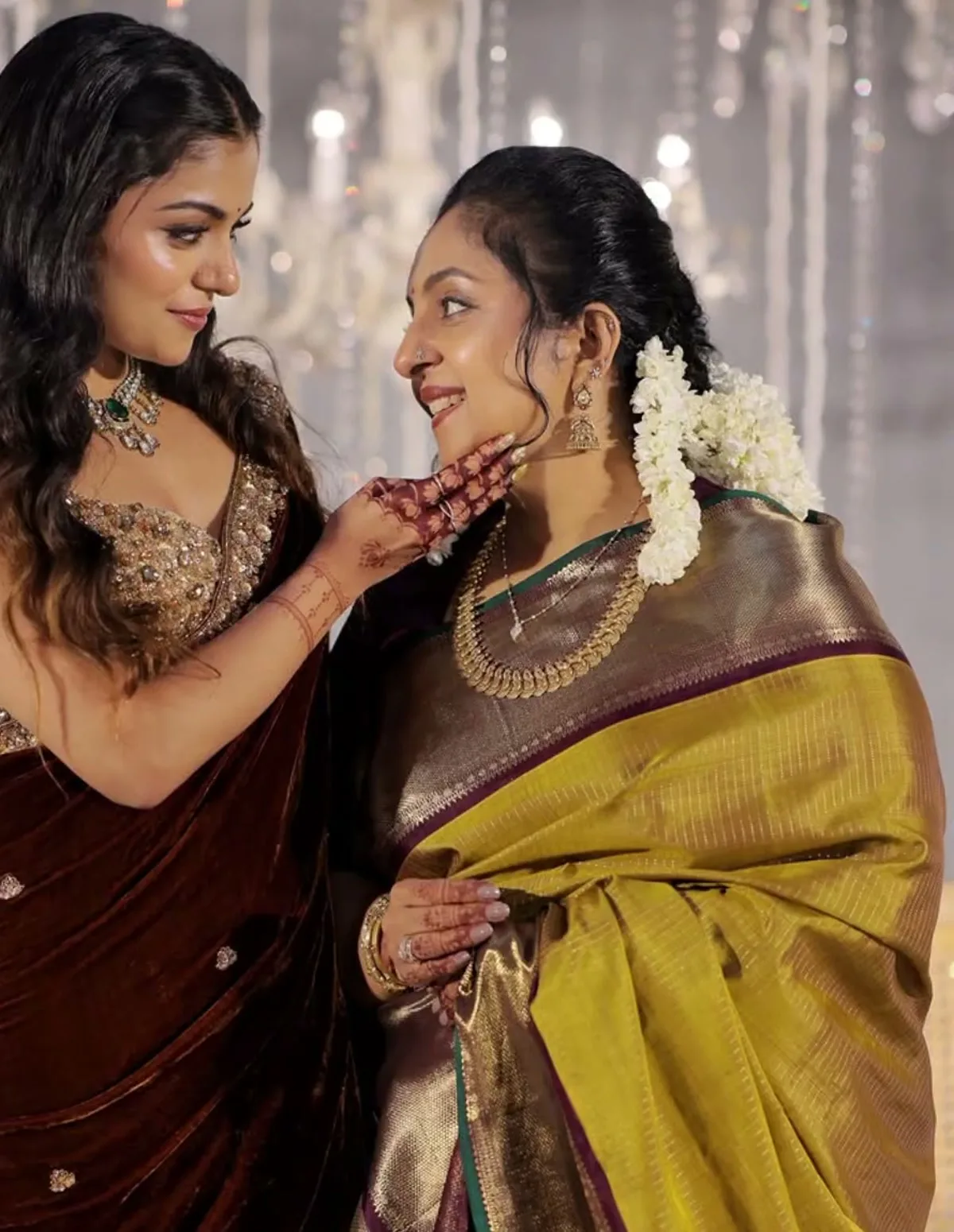 Sindhu Krishna — On the chandelier stage, the wine pallu and its gold bands